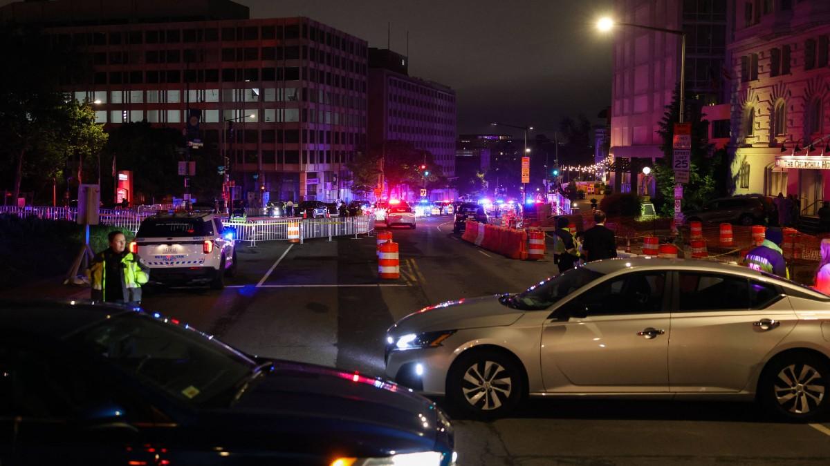 image of One officer was struck in a bullet-resistant vest but is in stable condition.