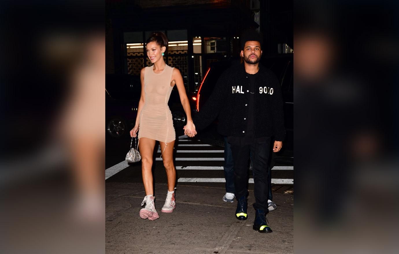 Bella Hadid And The Weeknd Take Late Night Pier Walk Photos