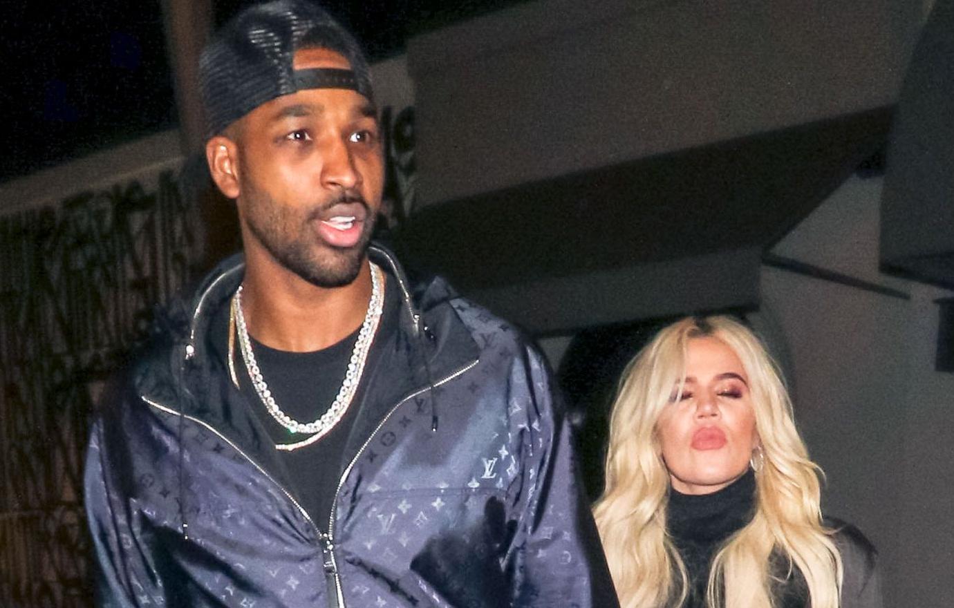 Tristan Thompson wore a athletic sweatshirt as he walked ahead of Khloe Kardashian, who sported a black outfit.