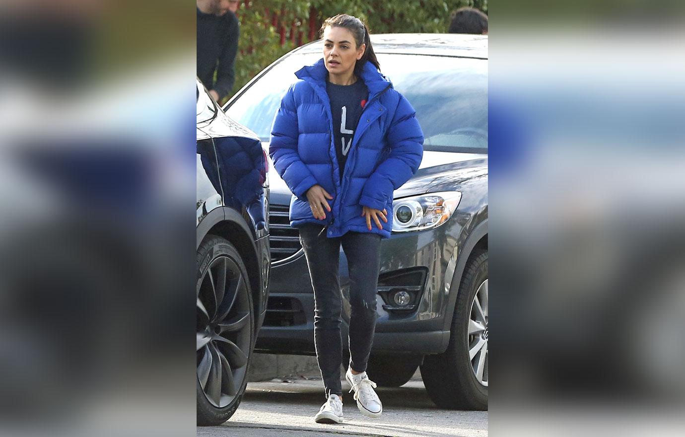 EXCLUSIVE: Mila Kunis all wrapped up for the chilly weather in LA