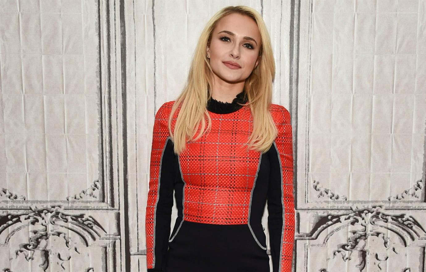 Hayden Panettiere was the picture of beauty and style in a black mini-skirt paired with a red and black patterned top.