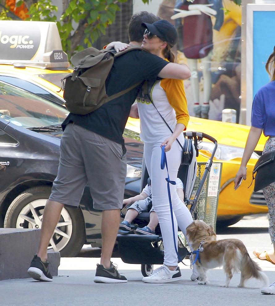 Anne Hathaway and little Jonathan enjoy the sun in the Big City