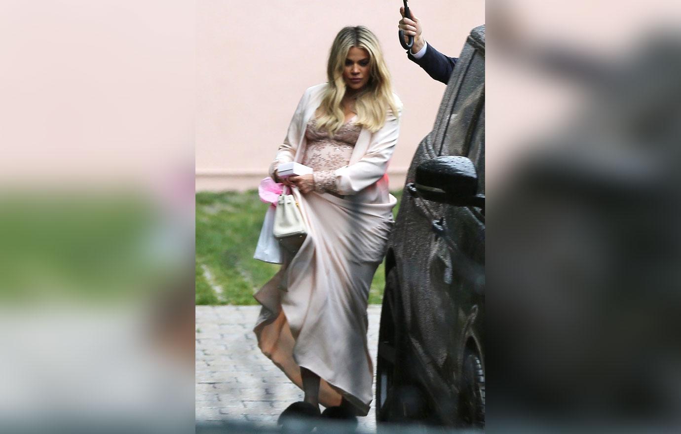 *EXCLUSIVE* Khloe Kardashian looks pretty in pink as she leaves her baby shower with Tristan Thompson