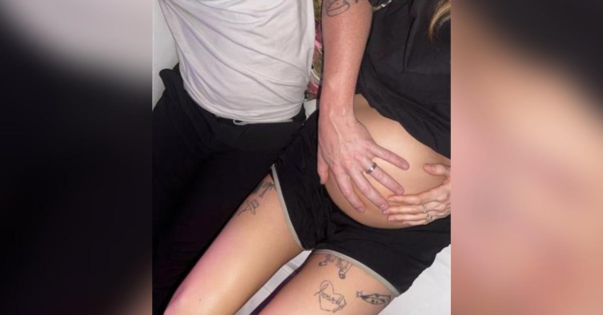 Image of Debby Ryan shared a photo of her husband Josh Dun's hand on her pregnant belly.
