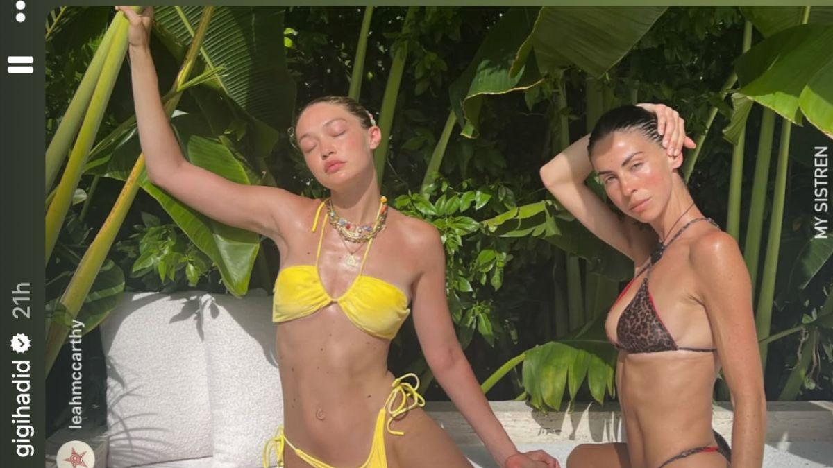 image of Gigi Hadid flaunted her toned physique in a bright yellow bikini during a relaxing outdoor photoshoot.