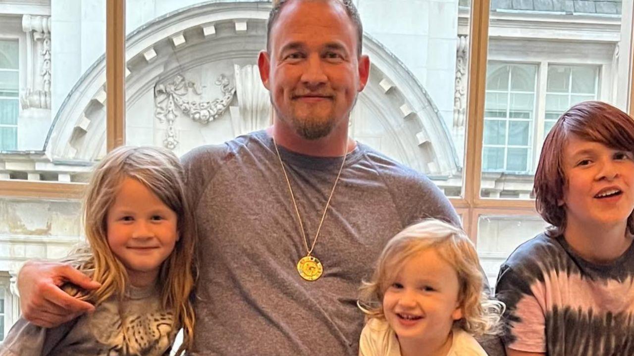 Photo of Alanis Morissette's husband and three children.
