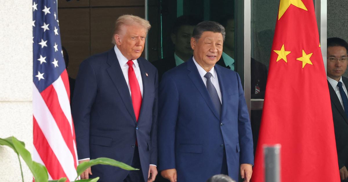 Image of Donald Trump and Xi Jinping posed for cameras ahead of their meeting.