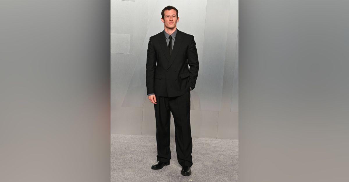 image of Callum Turner joined the singer at the event.