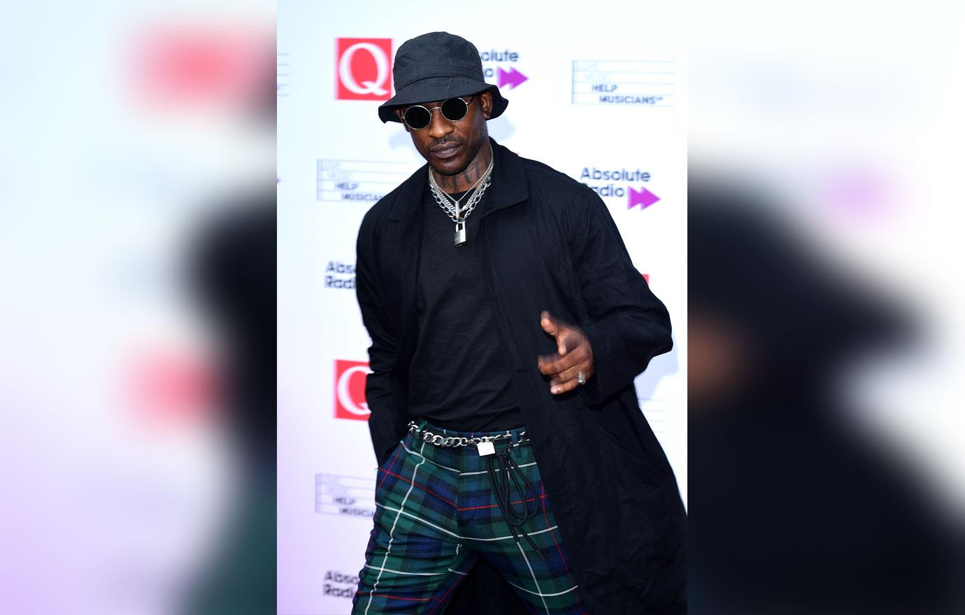 Rapper Skepta Wearing Hat and Glasses on red carpet adele rapper skepta dating