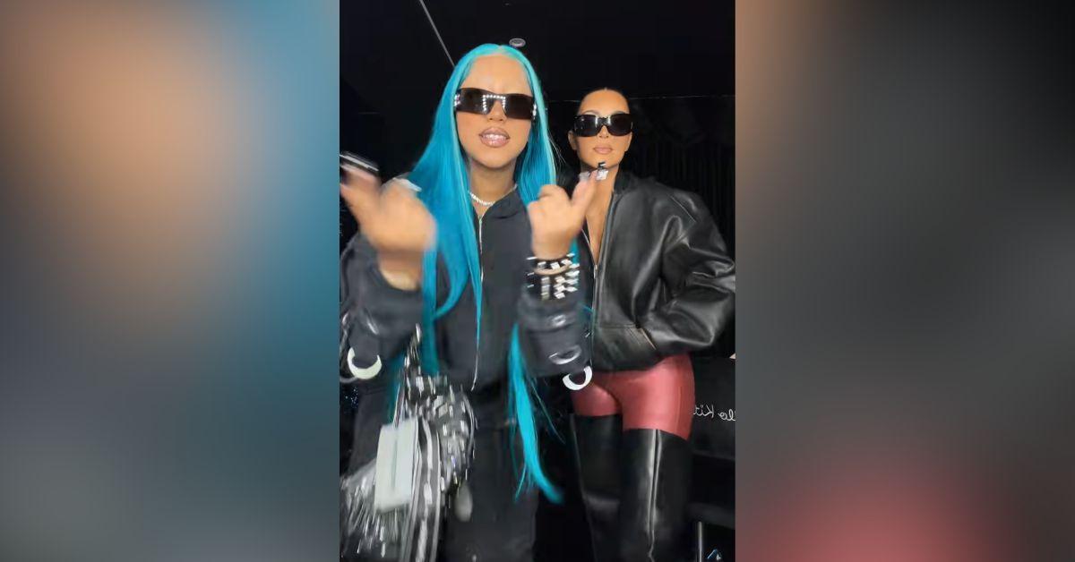 image of The 12-year-old wore an all-black outfit and styled her blue hair straight.