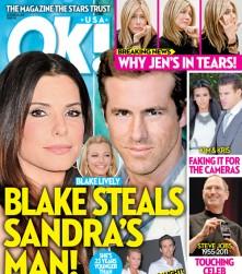 2011__10__OK043_sandra bullock ryan reynolds 221×300.jpg
