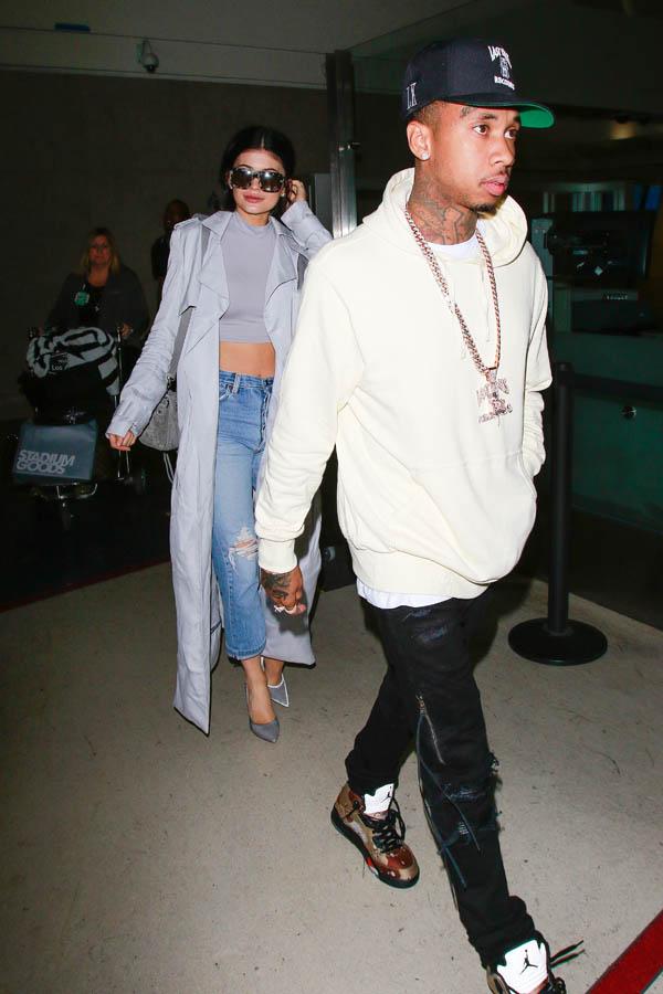 Kylie Jenner arriving at LAX with Tyga