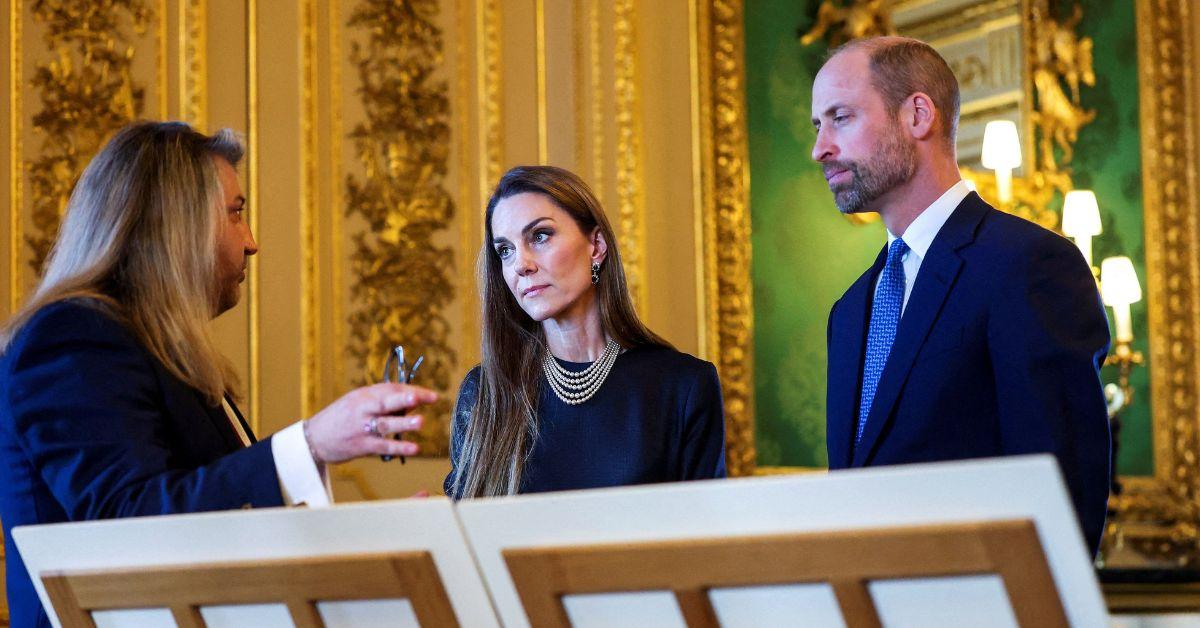 image of Prince William gave Kate Middleton a little back rub, seemingly to let her know she should wrap up her conversation.