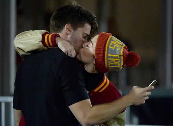 miley cyrus texting patrick swarzenegger liam hemsworth furious