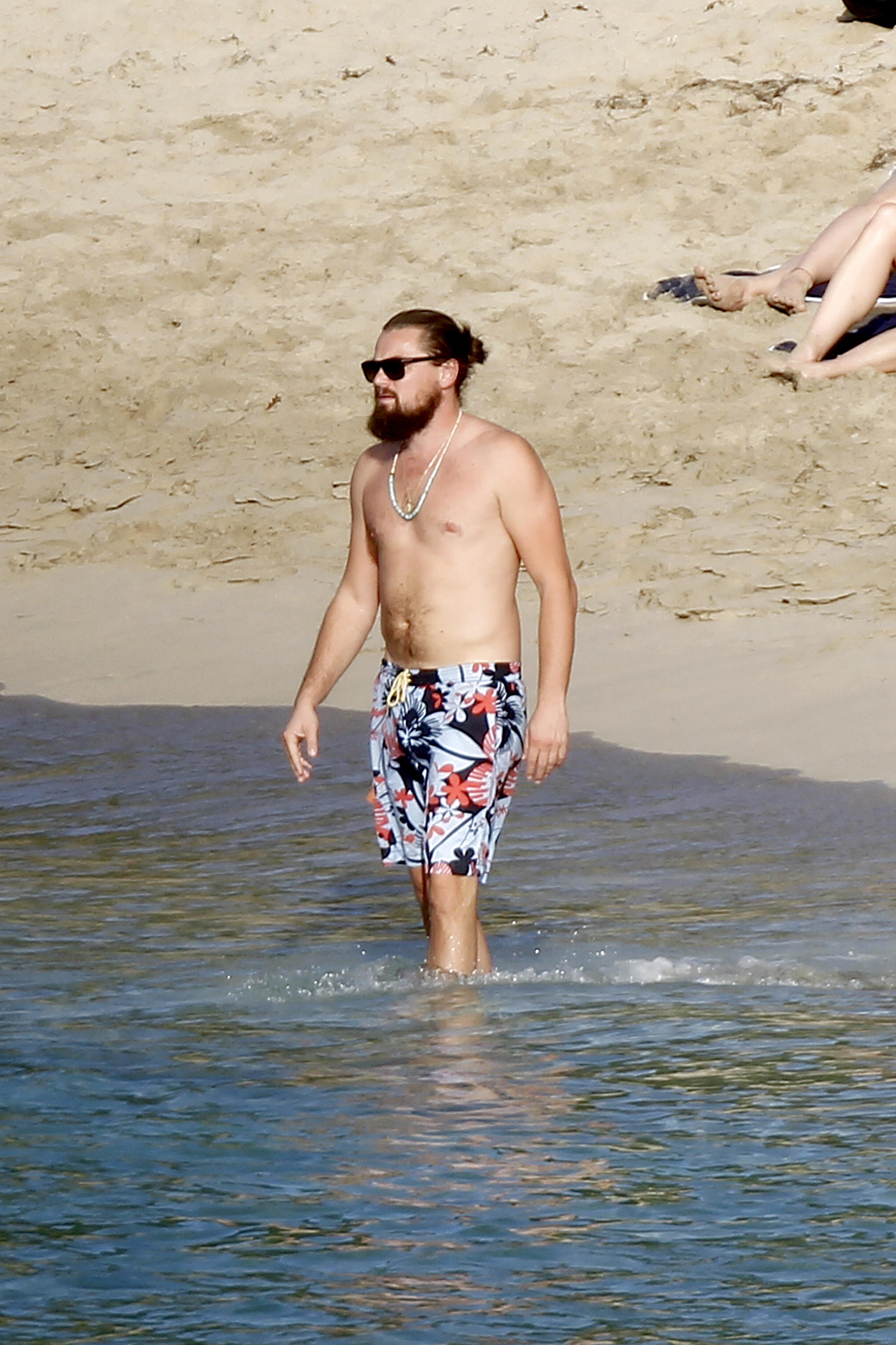 ** NO ITALY **Leonardo DiCaprio partying with a bevy of bikini clad beauties in St. Barth on NYE