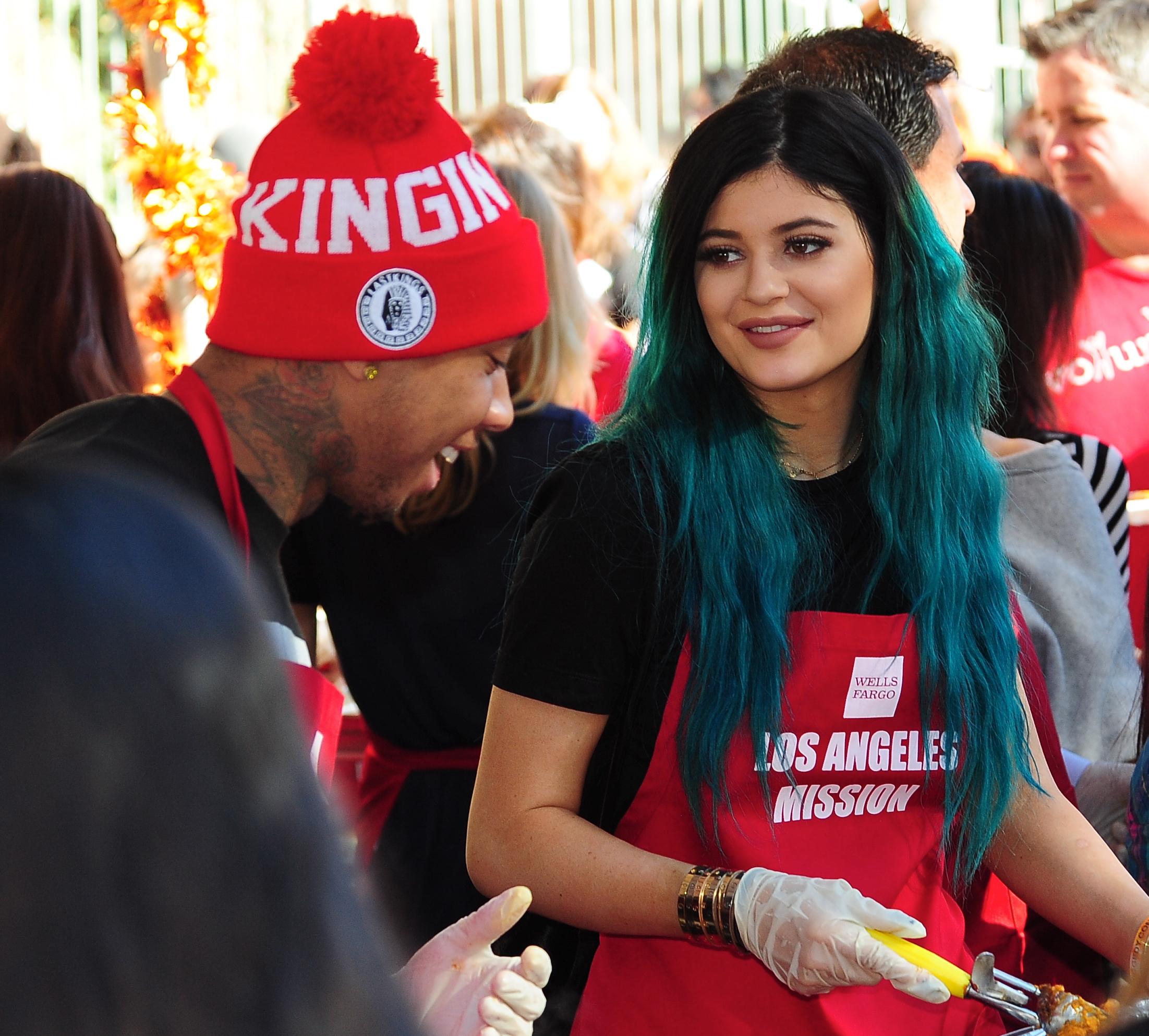 Kylie Jenner joins reported boyfriend, rapper Tyga, as they serve up Thanksgiving dinner to the homeless at the Los Angeles Mission in downtown Los Angeles, CA