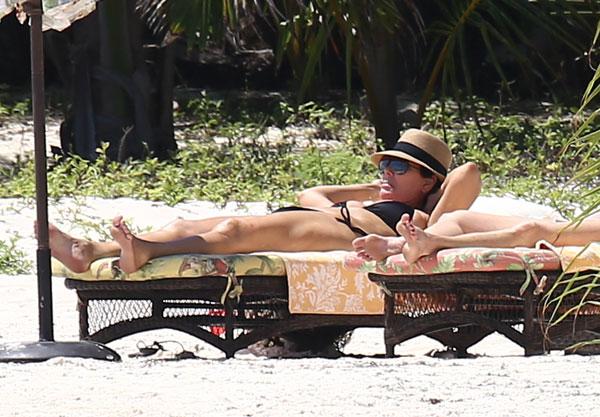 Kris jenner bikini beach dakota johnson melanie griffith​