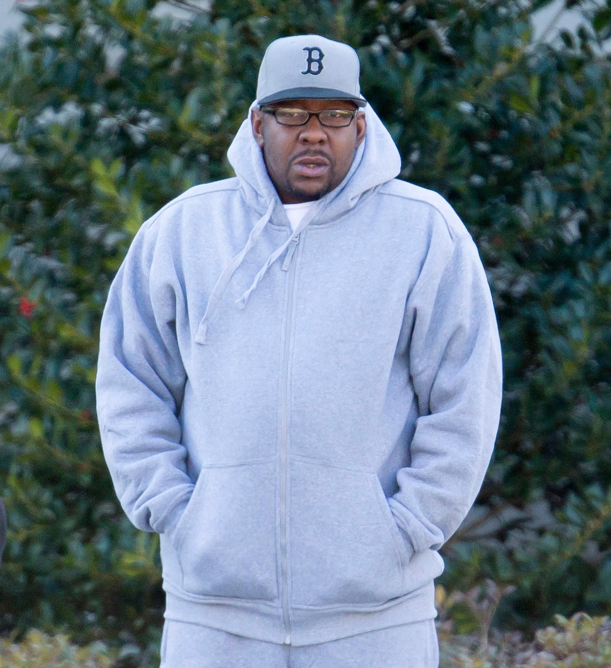 Bobby Brown seen on his birthday having another cigarette break outside Emory University Hospital in Atlanta.