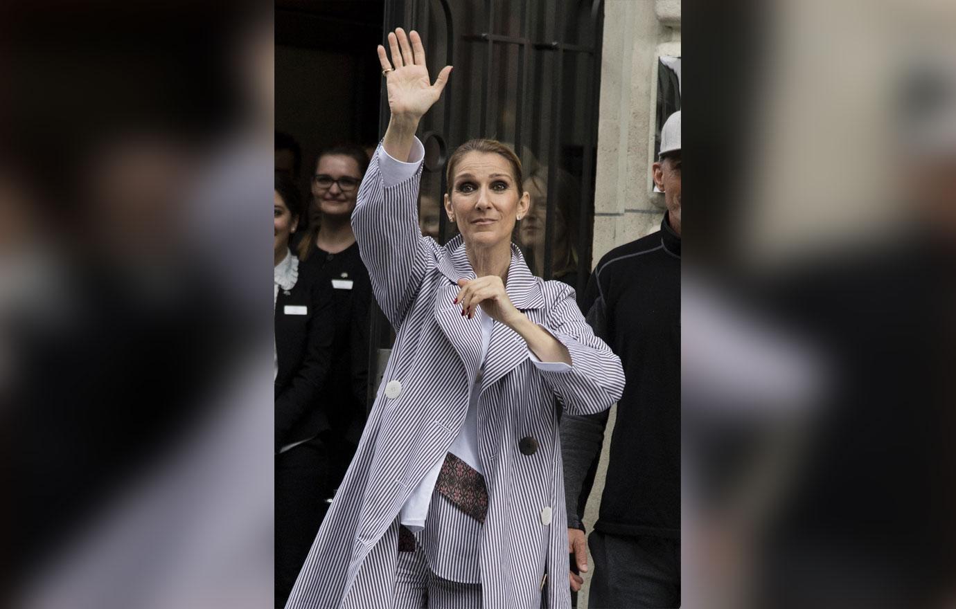 Celine Dion waves to her fans in Paris before catching a flight