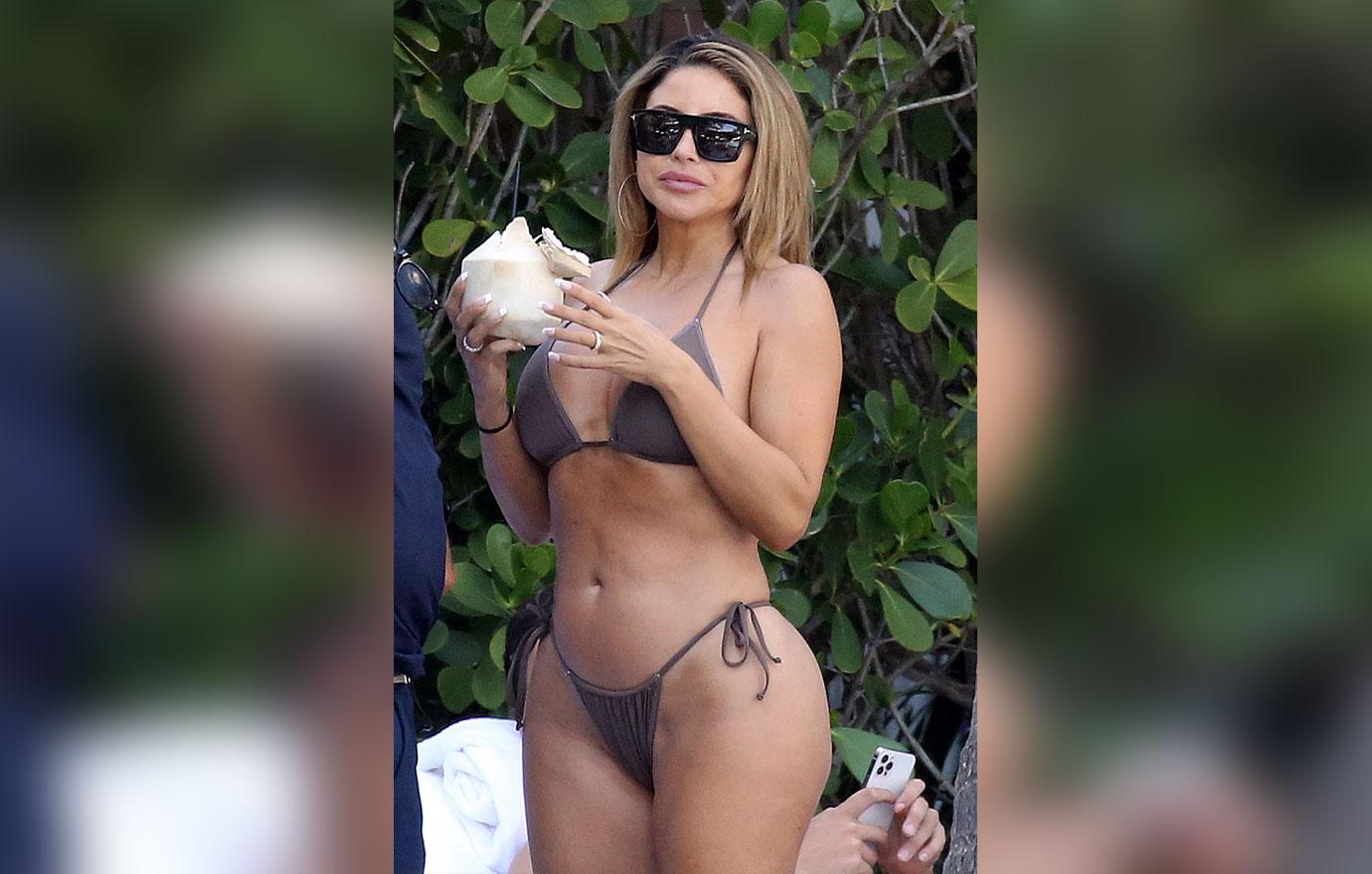 larsa pippen poolside in bikini with mystery man