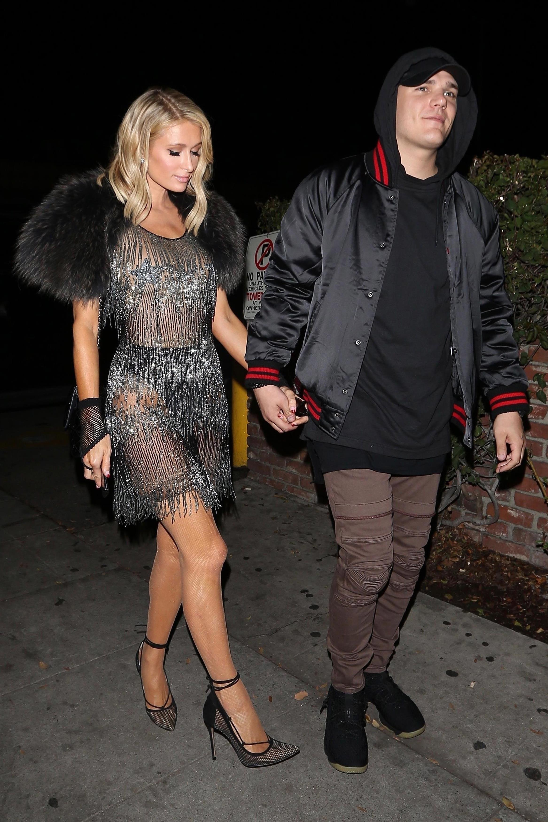 Paris Hilton and Chris Zylka arrive at Delilah for date night