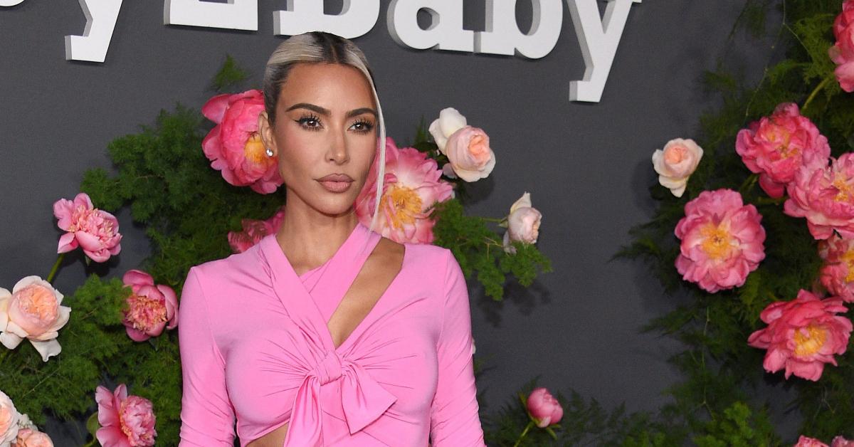 Kim Kardashian bares abs in Valentine's Day pink at Skims pop-up