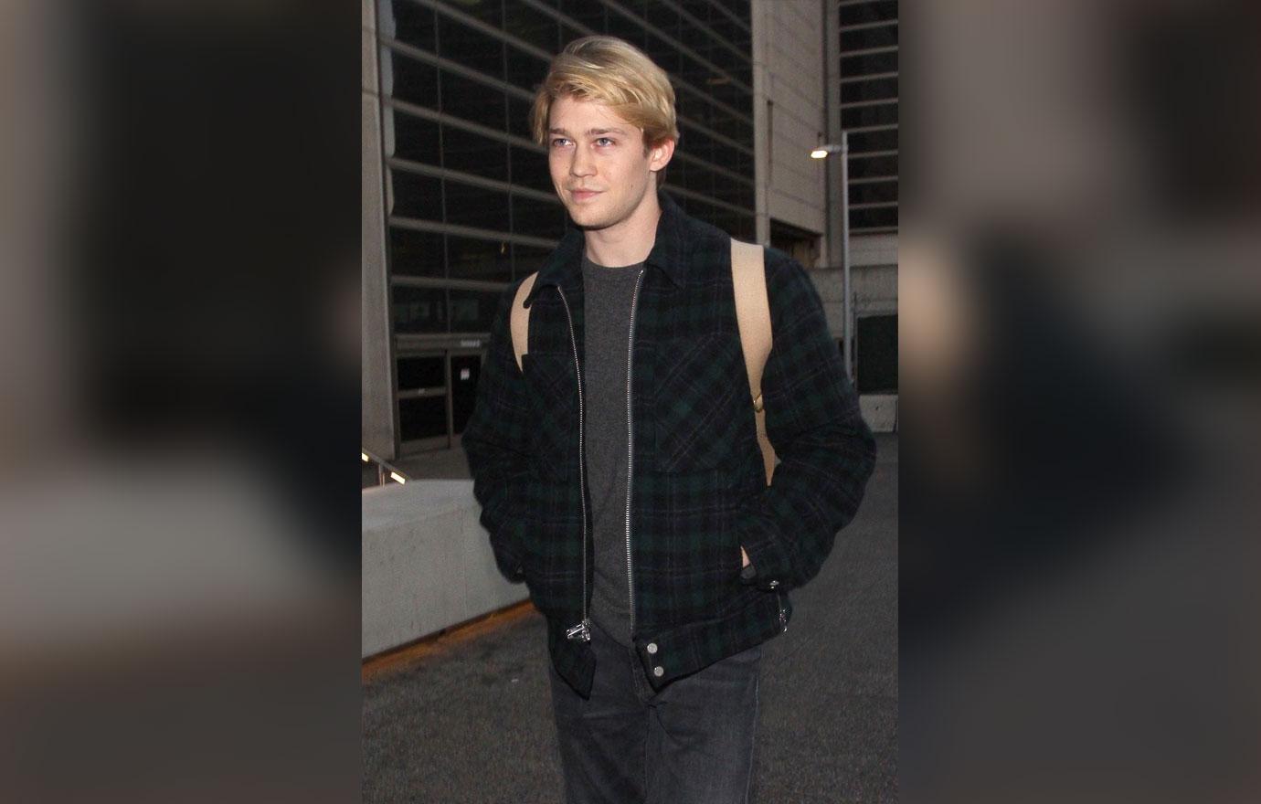 Joe Alwyn touches down in Los Angeles from London