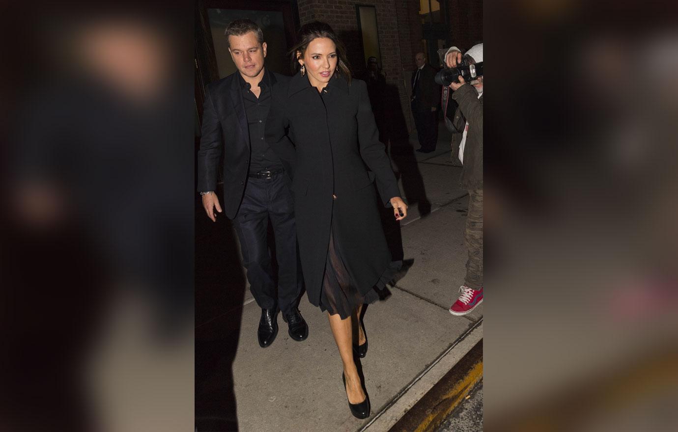 Matt damon carries wife purse