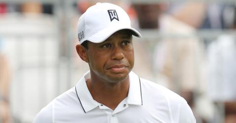 Tiger Woods putts around at the Quicken Loans National