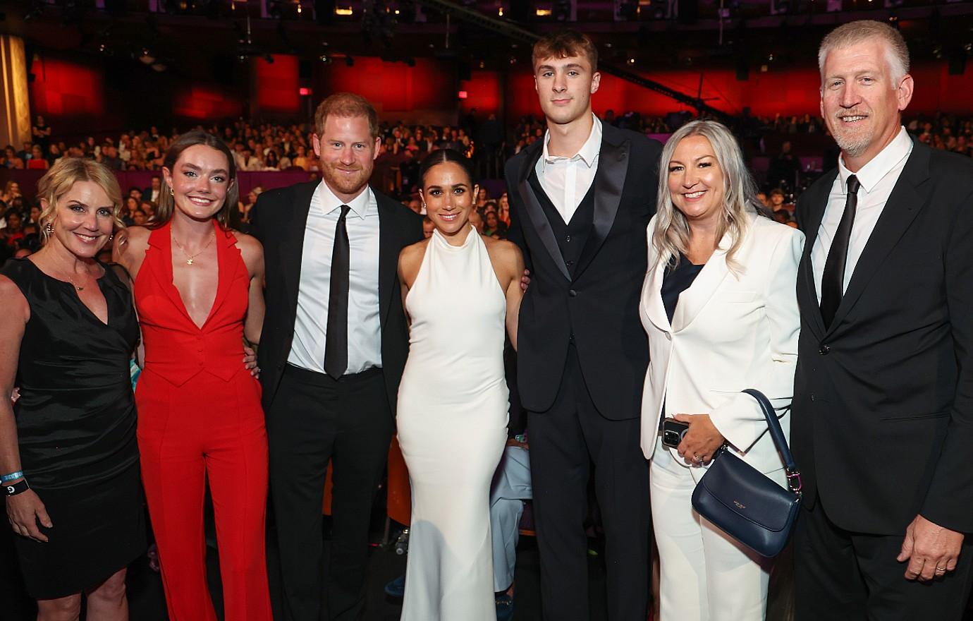 prince harry and meghan markle with flagg and engelhardt with