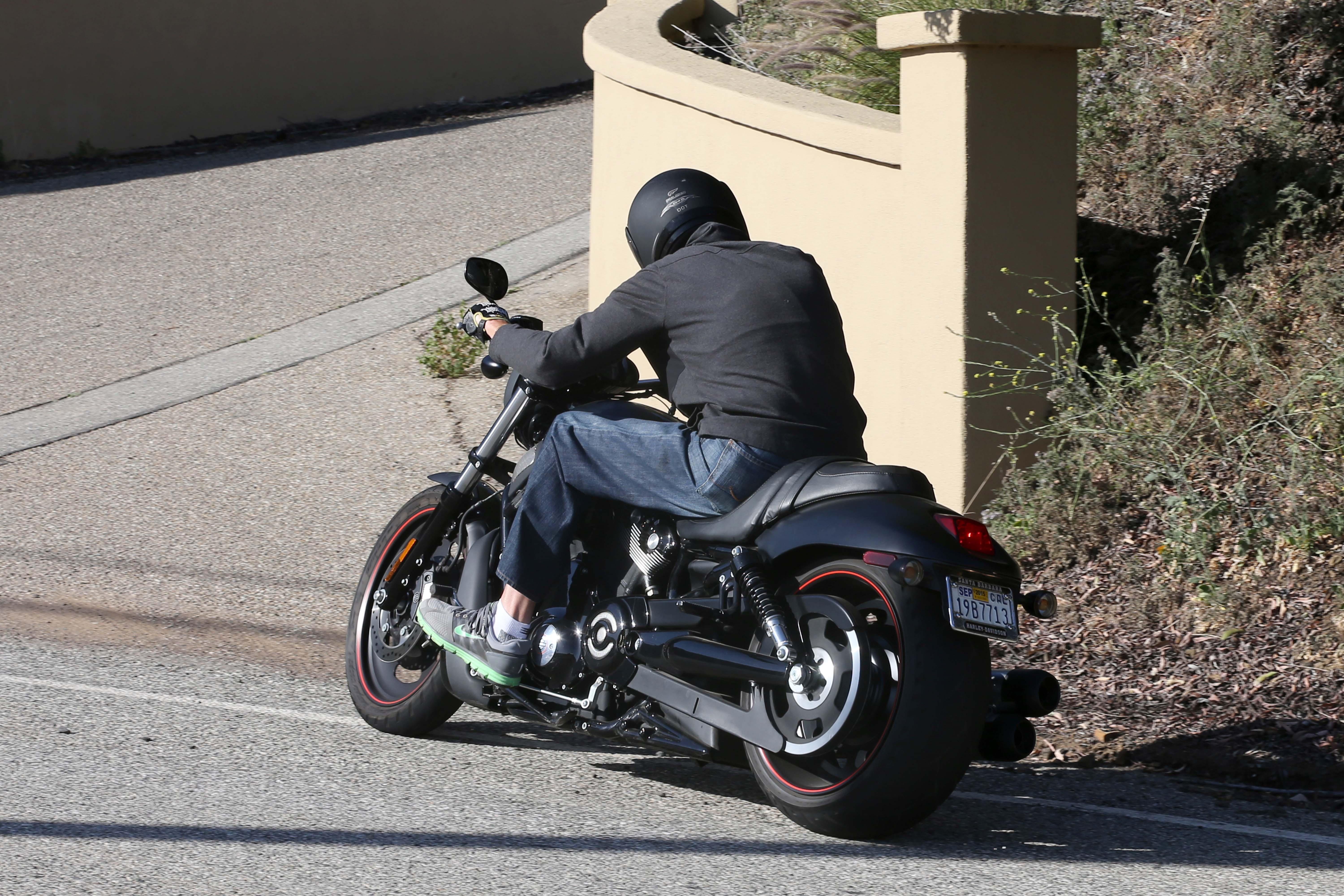 EXCLUSIVE: ** PREMIUM RATES APPLY** Bruce Jenner goes for a late afternoon spin on his motorcycle.