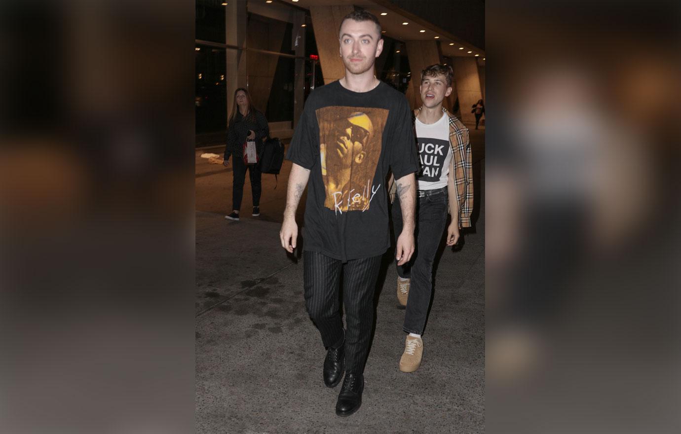 Sam Smith and boyfriend Brandon Flynn are seen celebrating at the SNL after party at STK in New York City.