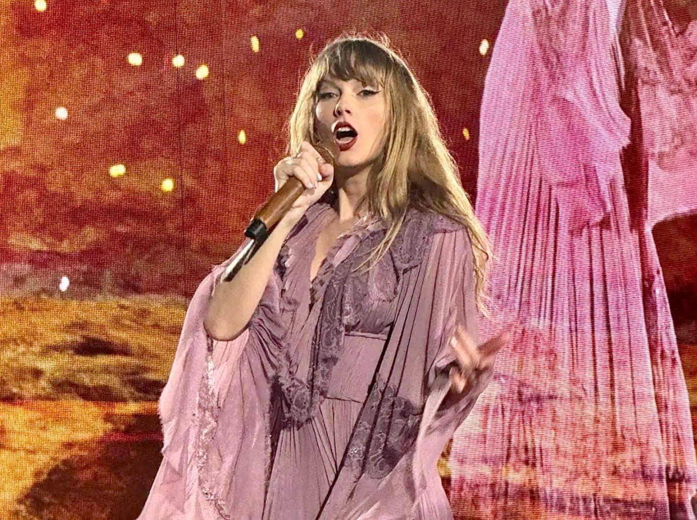 taylor swift theories mysterious figure seen dancing madrid concert watch