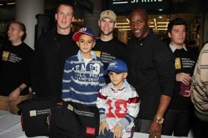 2010__12__CombatToCareer Kevin Boss Deon Grant and Fans3821110 300×199.jpg