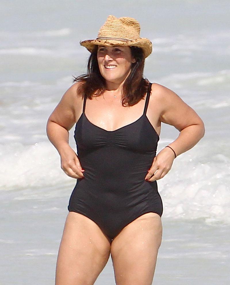 Ouch! Ricki Lake Struggles With Her Tight Bathing Suit While In