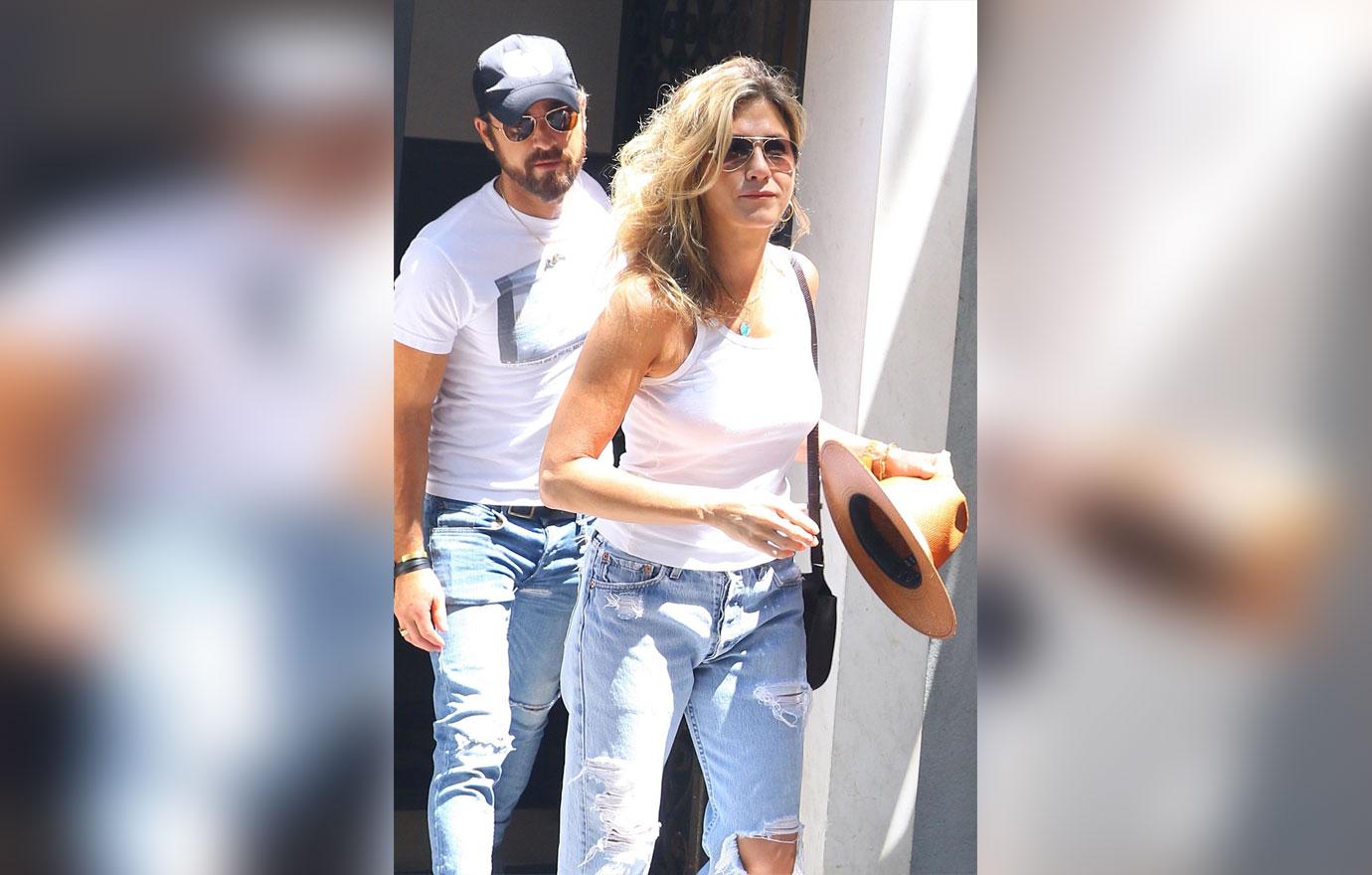 Jennifer Aniston and Justin Theroux leaving their apartment in NYC