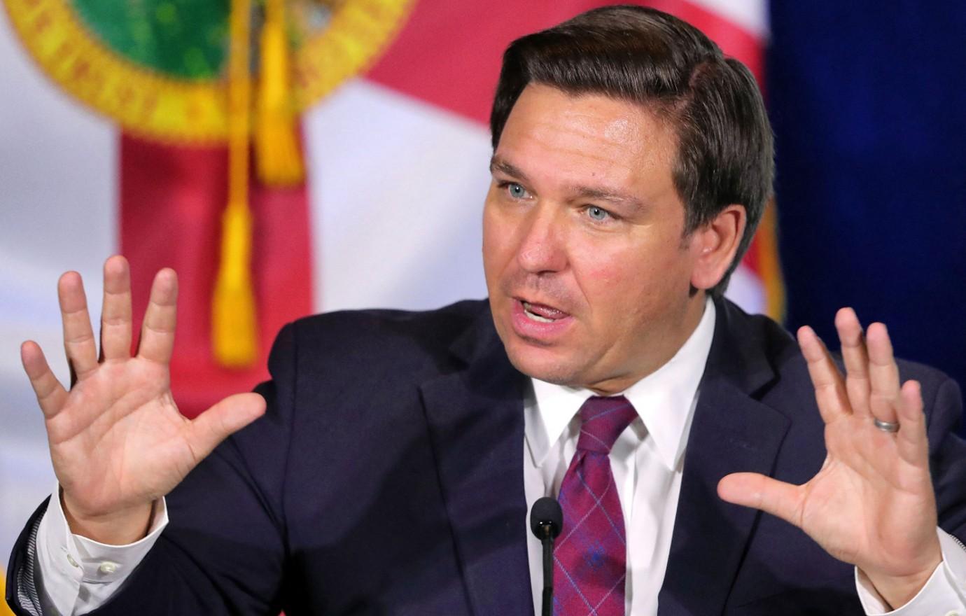 ron desantis mocked large chair makes him look little boy