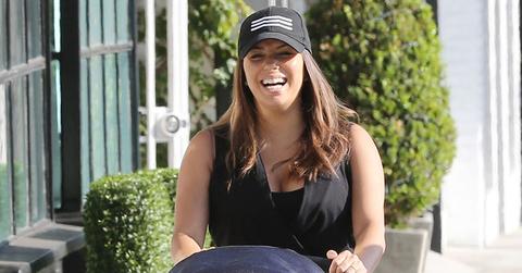Eva longoria no makeup holding baby santiago main