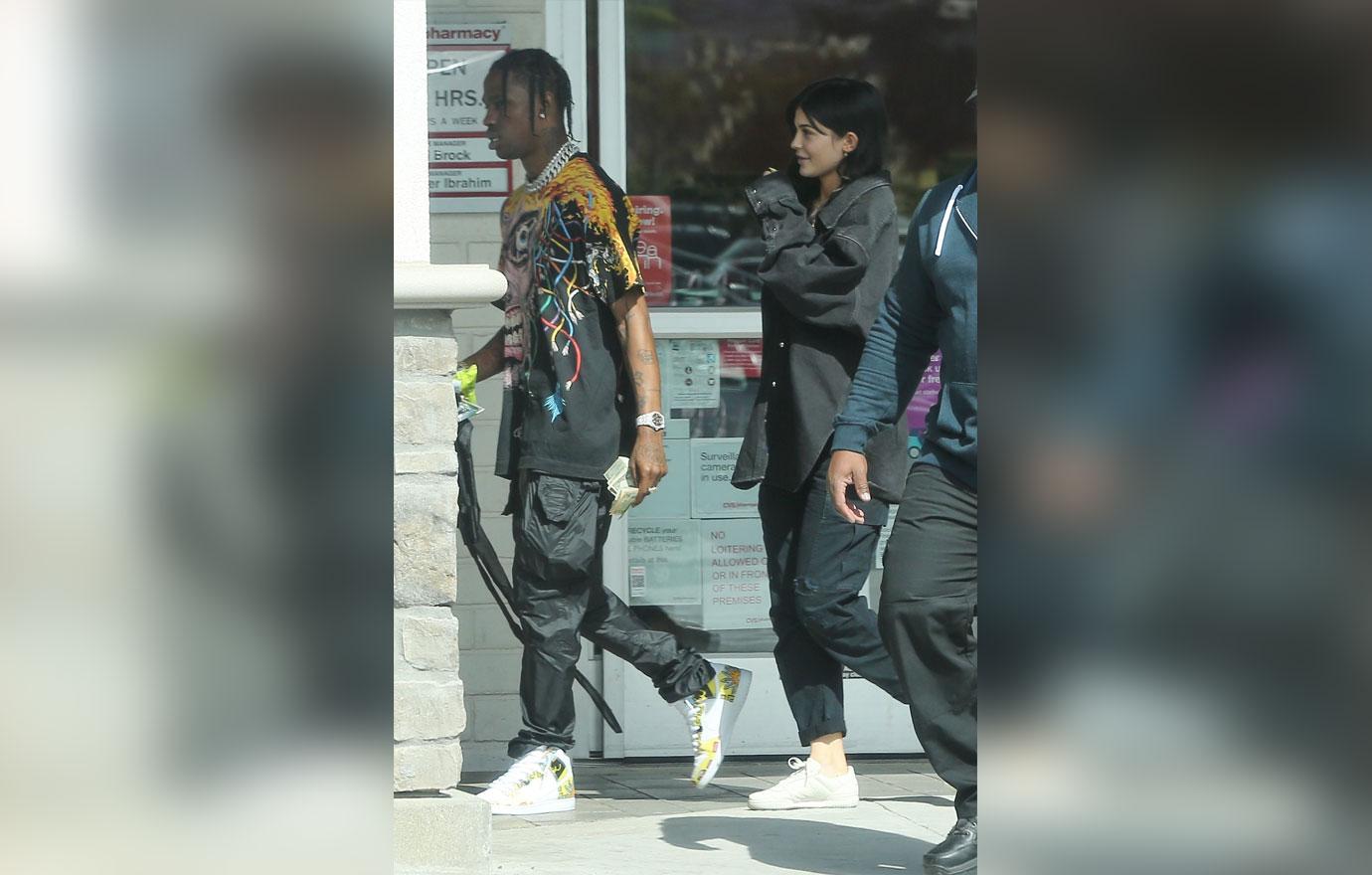 *EXCLUSIVE* A barefaced Kylie Jenner goes on a CVS run with Travis Scott