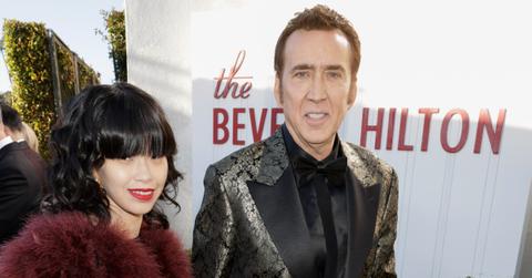 nicolas cage holds hands wife riko shibata golden globespp