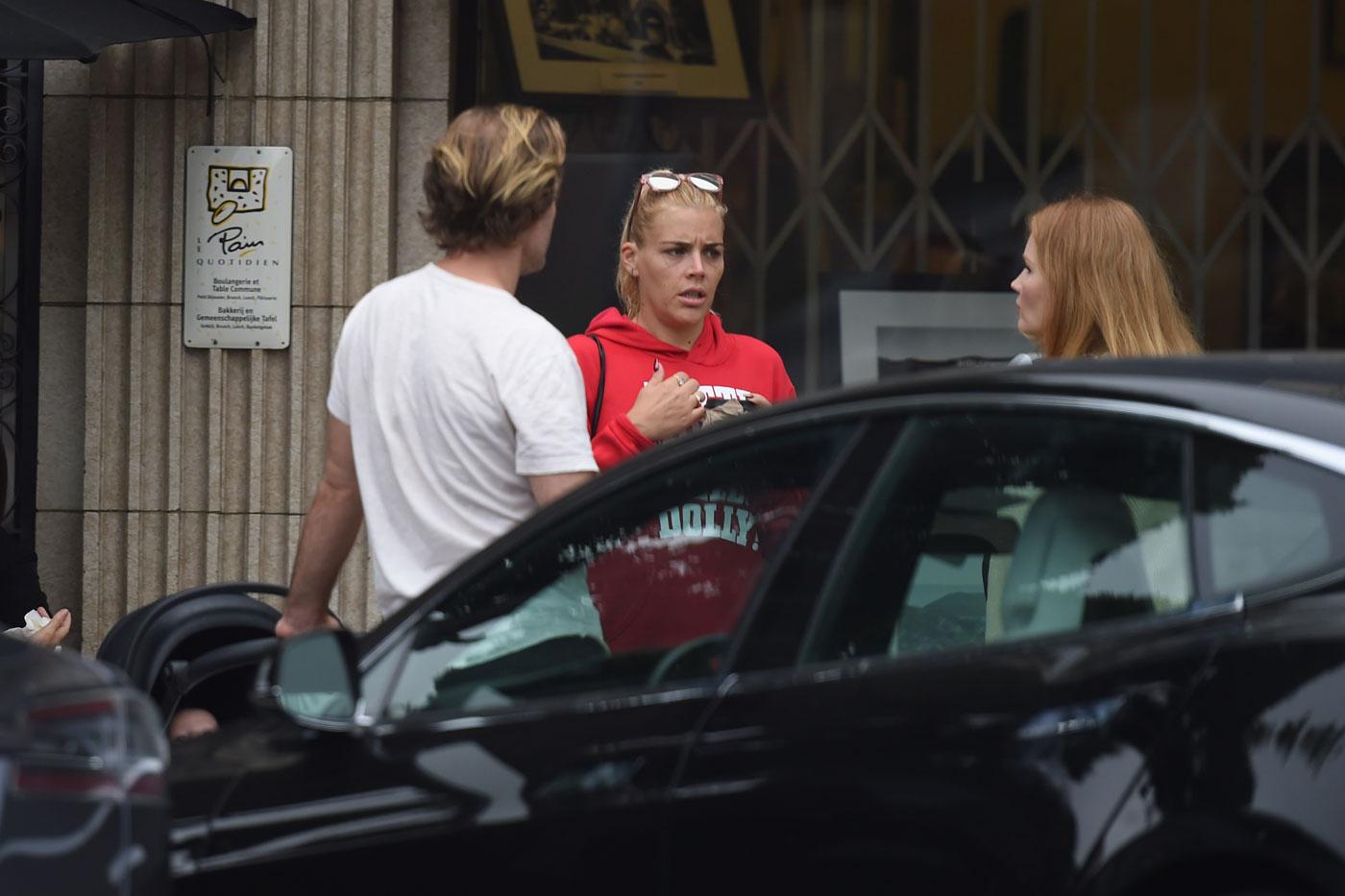 EXCLUSIVE: James Van Der Beek gives Busy Philipps a hug as they chat outside a cafe