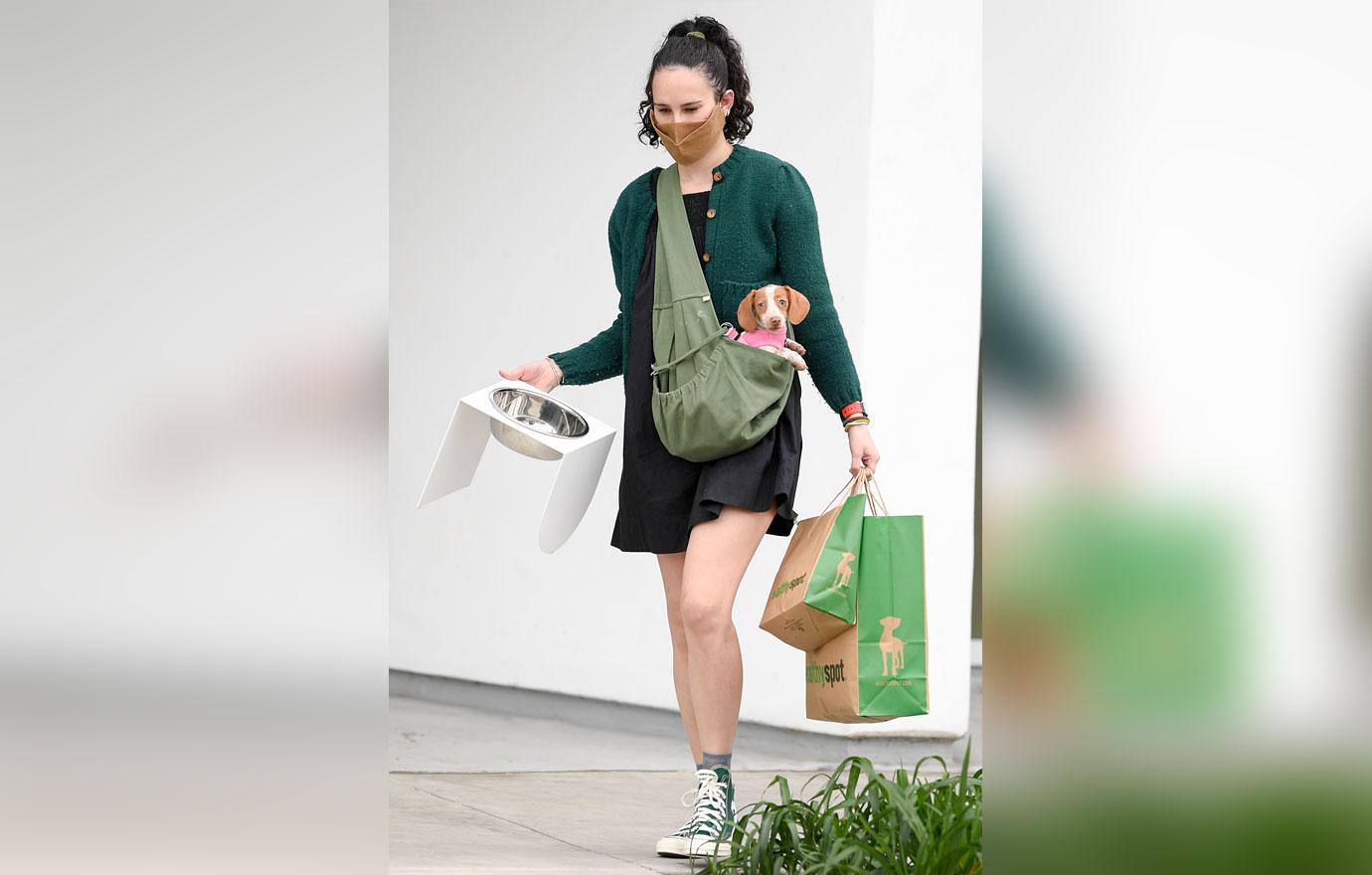 rumer willis donates at goodwill with dog