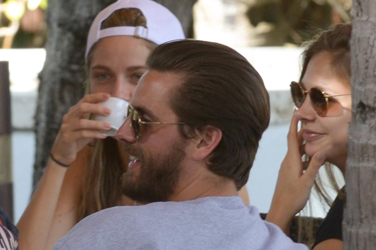 Scott Disick has lunch with his babe and friends by the beach in Miami