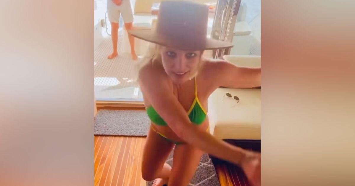 singer bikini clad britney spears touches herself dance moves boat