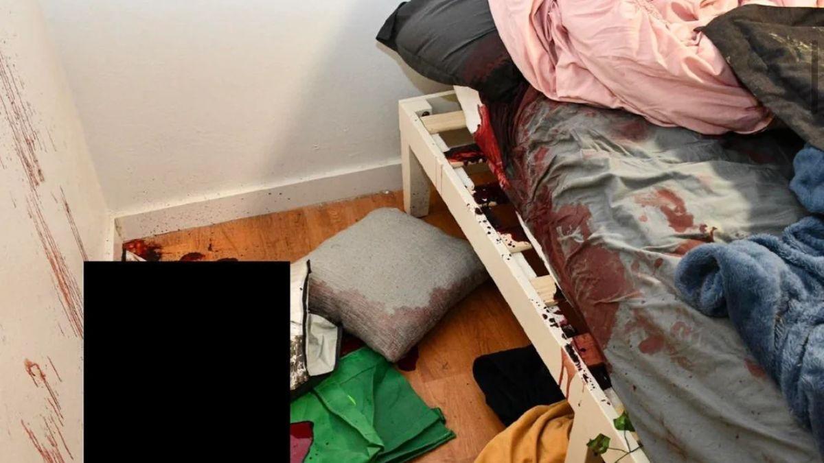 image of Redacted photos of the bedrooms where the victims were brutally stabbed to death depict a bloodbath.