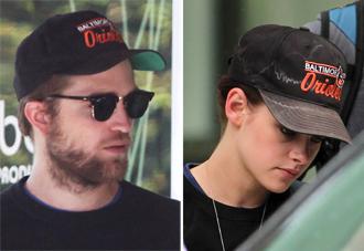 Kristen stewart rob pattinson may9 orioles hat.jpg