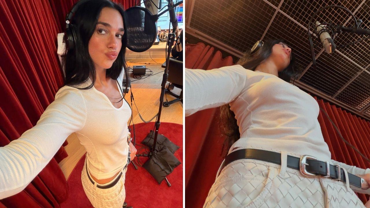 image of Dua Lipa paired the white top with patterned trousers, a dark belt and gold-toned accessories for a coordinated look.