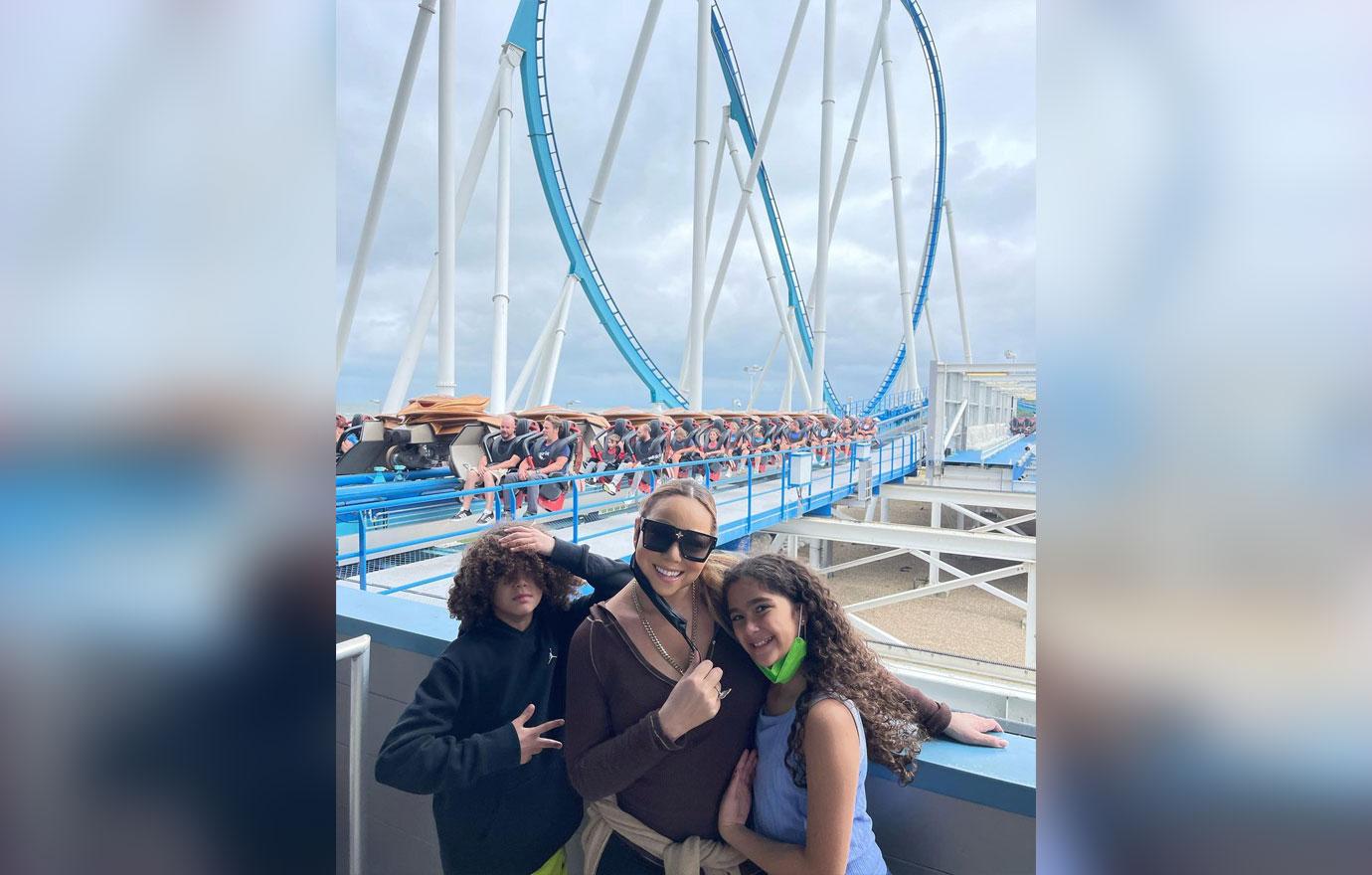 mariah carey spends time with her children at amusement park