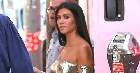 kourtney Kardashian shows skin sexy gold dress pics long