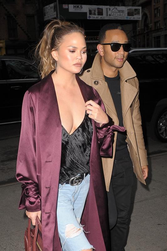 Chrissy Teigen and John Legend arrive hand in hand at The Bowery Hotel